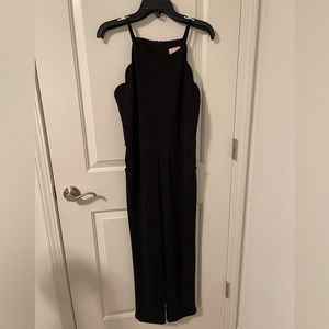 Black jumpsuit with design at top